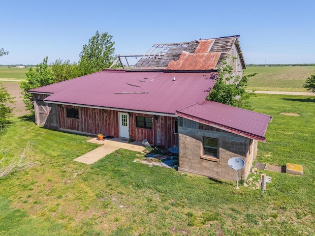 14431 E 2400 N Rd, Hudson, IL 61748 - view of front of house with a front yard and metal roof