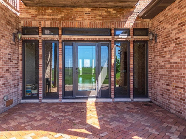 14431 E 2400 N Rd, Hudson, IL 61748 - property entrance featuring brick siding