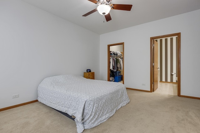 bedroom with carpet and baseboards