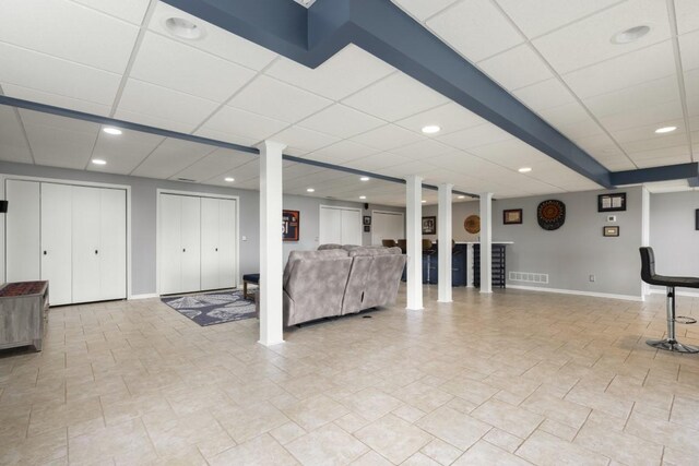 interior space featuring baseboards, visible vents, and recessed lighting