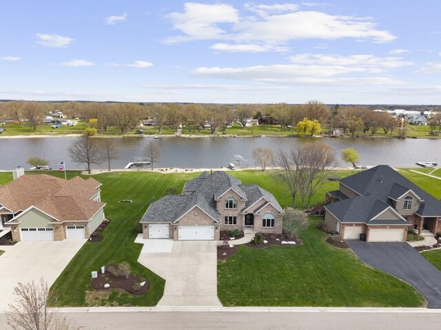 bird's eye view with a residential view and a water view