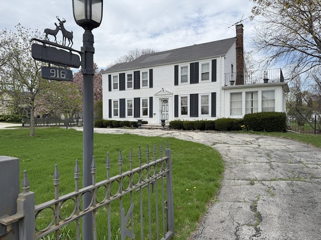 916 W Campbell St, Arlington Heights, IL 60005 - colonial house featuring a chimney