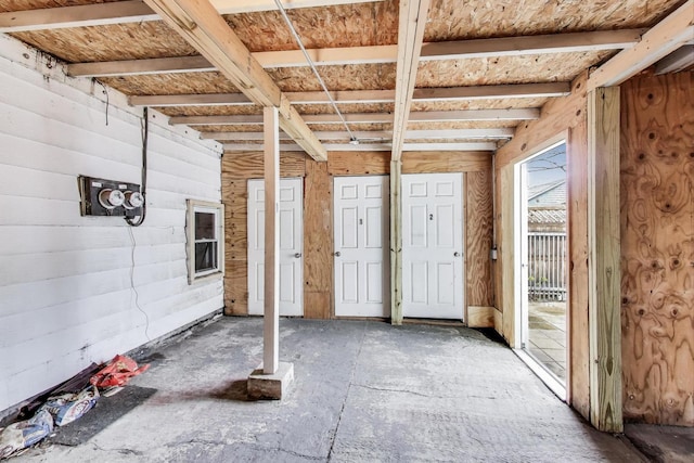 interior space featuring wood walls