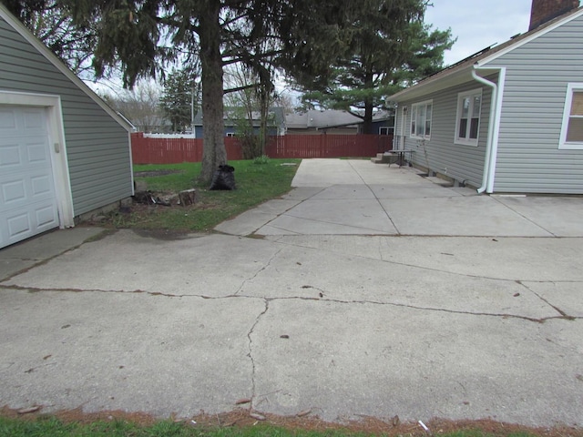 view of yard with fence and a patio area