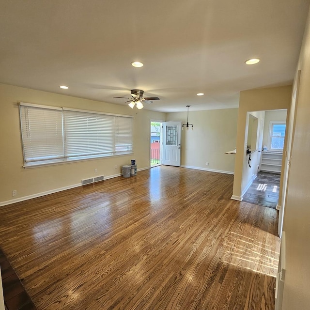 unfurnished room featuring dark wood-style floors, a ceiling fan, recessed lighting, and baseboards