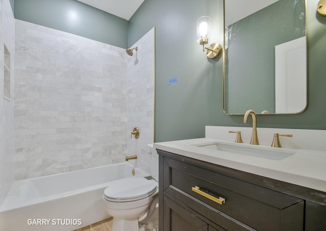 full bathroom featuring shower / bathing tub combination, vanity, and toilet