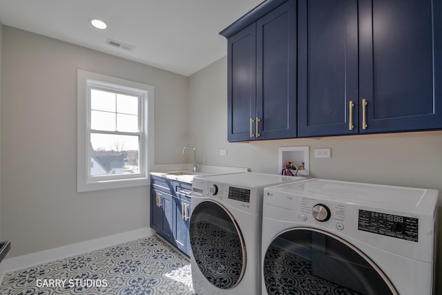 laundry area with a sink, cabinet space, washing machine and dryer, baseboards, and visible vents
