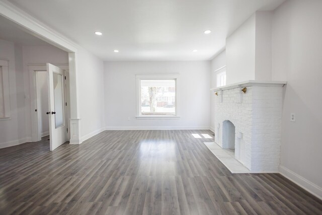 231 S Chicago Ave, Kankakee, IL 60901 - unfurnished living room featuring recessed lighting, wood finished floors, and baseboards