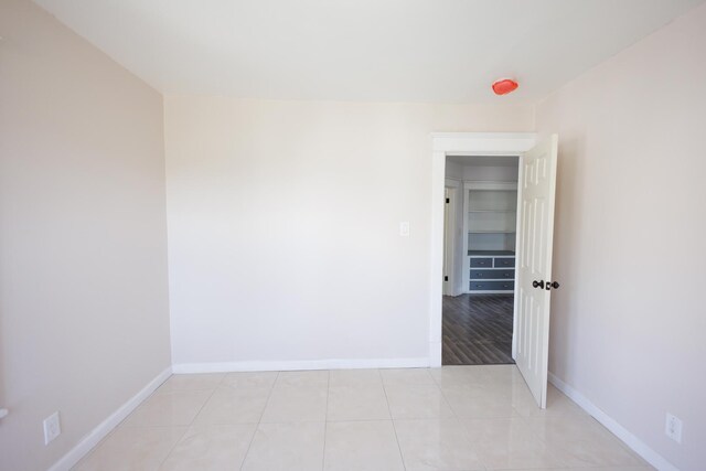 231 S Chicago Ave, Kankakee, IL 60901 - unfurnished room featuring baseboards and light tile patterned floors