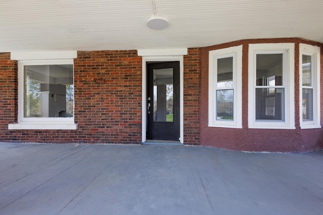 231 S Chicago Ave, Kankakee, IL 60901 - doorway to property featuring brick siding