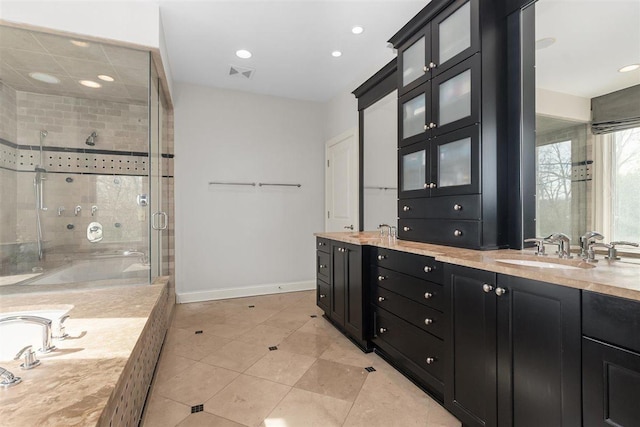 1784 Reserve Ct, Highland Park, IL 60035 - full bathroom with a stall shower, baseboards, double vanity, tile patterned floors, and recessed lighting