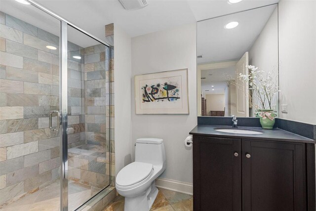 1784 Reserve Ct, Highland Park, IL 60035 - bathroom with toilet, vanity, a shower stall, baseboards, and recessed lighting