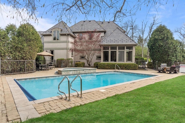1784 Reserve Ct, Highland Park, IL 60035 - view of swimming pool featuring an in-ground hot tub, a patio area, and a sunroom