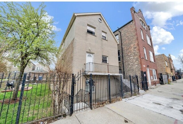 2629 W Luther St, Chicago, IL 60608 - exterior space featuring a fenced front yard