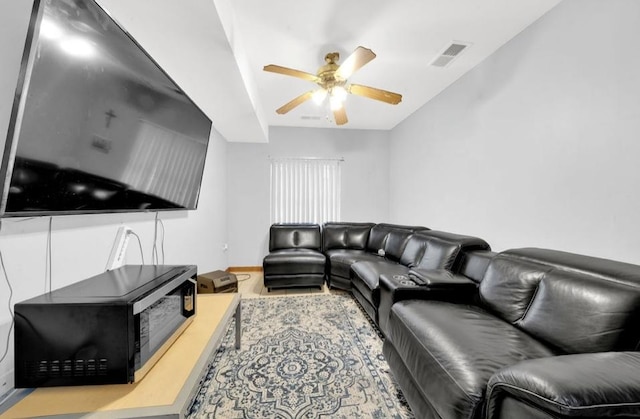 2629 W Luther St, Chicago, IL 60608 - living room with baseboards, a ceiling fan, and visible vents