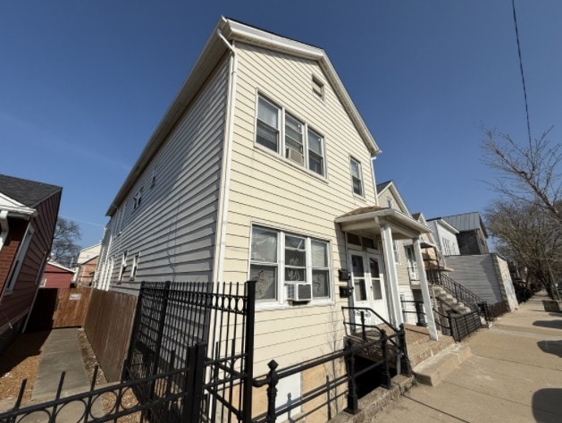 2919 S Quinn St, Chicago, IL 60608 - traditional home featuring cooling unit and fence private yard