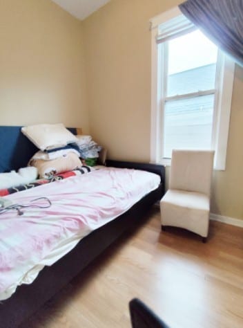 2919 S Quinn St, Chicago, IL 60608 - bedroom featuring baseboards and wood finished floors