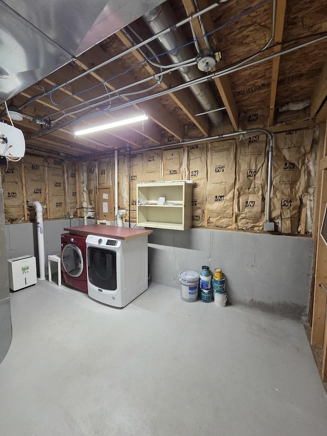 unfinished basement with separate washer and dryer