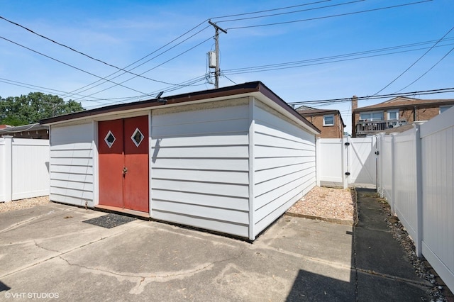 7046 W 63rd Pl, Chicago, IL 60638 - view of shed with a fenced backyard and a gate