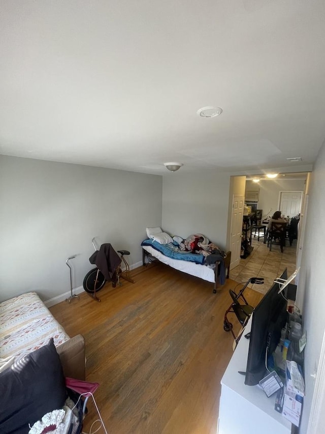 bedroom featuring light wood-type flooring