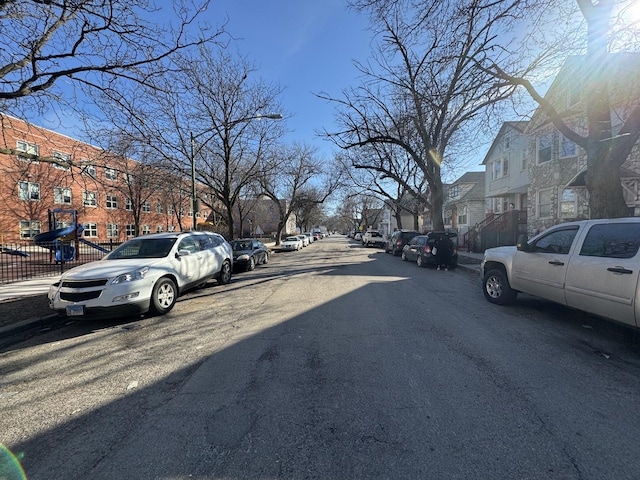 view of street with a residential view and sidewalks