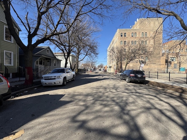view of road featuring curbs and sidewalks
