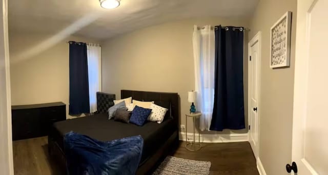 5413 N Artesian Ave, Chicago, IL 60625 - bedroom with vaulted ceiling and wood finished floors