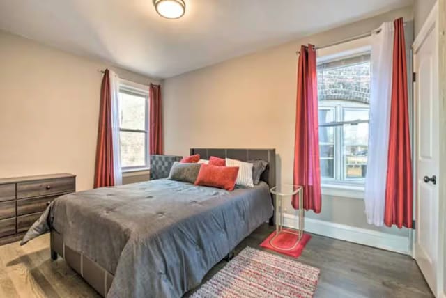 5413 N Artesian Ave, Chicago, IL 60625 - bedroom with wood finished floors and baseboards