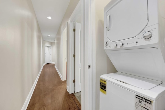 4538 S Calumet Ave Unit 3N, Chicago, IL 60653 - washroom with stacked washer / drying machine, recessed lighting, laundry area, baseboards, and wood finished floors