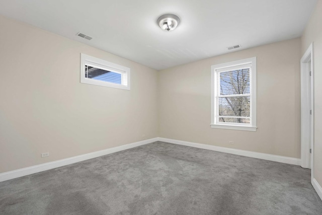 4538 S Calumet Ave Unit 3N, Chicago, IL 60653 - carpeted empty room with visible vents and baseboards