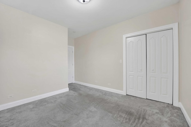 4538 S Calumet Ave Unit 3N, Chicago, IL 60653 - unfurnished bedroom featuring carpet, a closet, and baseboards