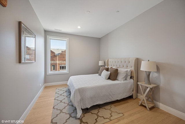bedroom featuring recessed lighting, baseboards, visible vents, and light wood-type flooring