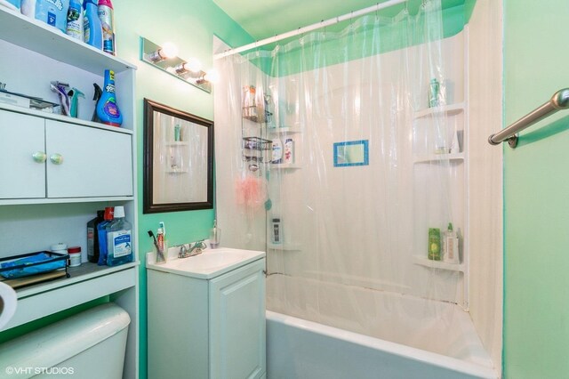 8119 S Escanaba Ave, Chicago, IL 60617 - bathroom featuring vanity and shower / bath combination with curtain