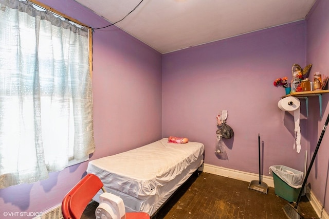 8119 S Escanaba Ave, Chicago, IL 60617 - bedroom featuring wood finished floors and baseboards