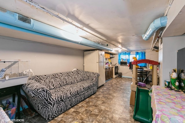 8119 S Escanaba Ave, Chicago, IL 60617 - basement with freestanding refrigerator