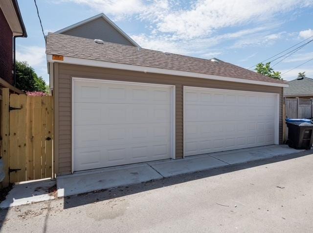 garage featuring fence