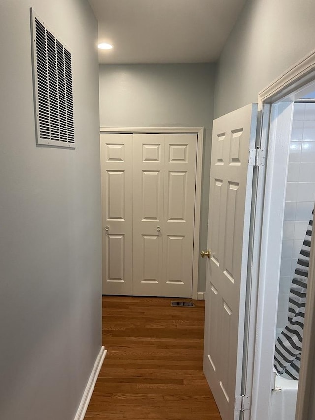 1811 Emerson St, Evanston, IL 60201 - hallway with visible vents, baseboards, recessed lighting, and dark wood finished floors