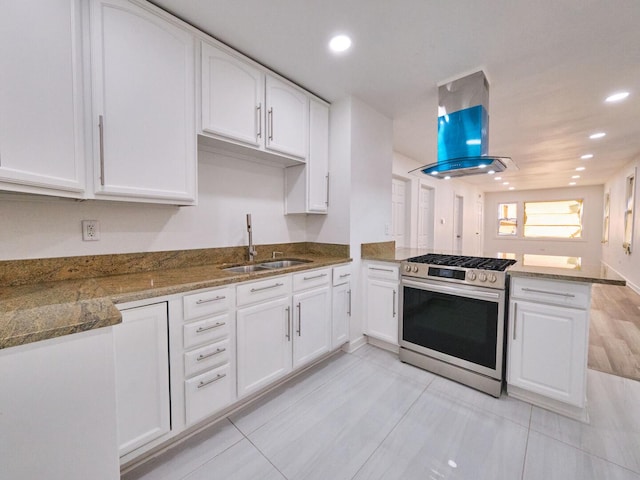14923 Wood St, Harvey, IL 60426 - kitchen with island range hood, stainless steel range with gas cooktop, a sink, and white cabinets
