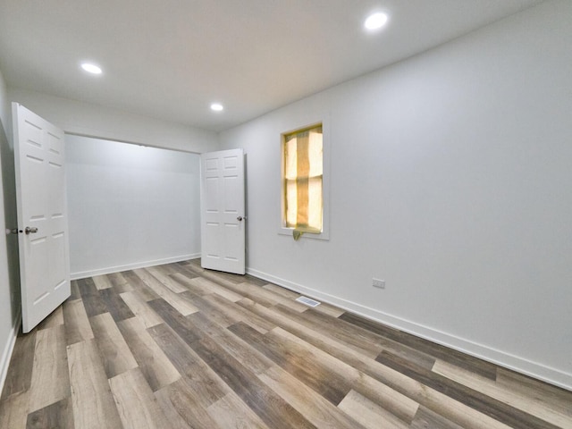 14923 Wood St, Harvey, IL 60426 - interior space with recessed lighting, wood finished floors, and visible vents