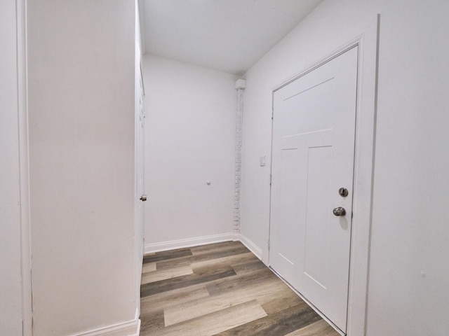 14923 Wood St, Harvey, IL 60426 - doorway featuring baseboards and wood finished floors