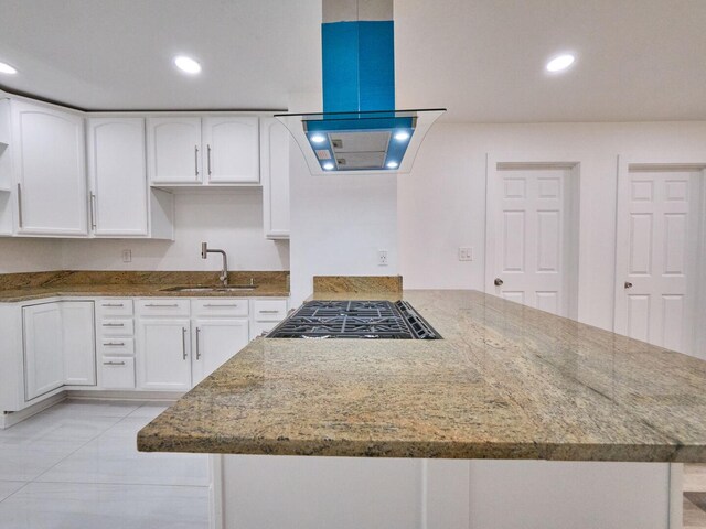 14923 Wood St, Harvey, IL 60426 - kitchen featuring island range hood, light stone countertops, a sink, and white cabinets