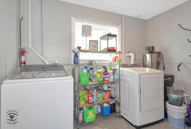 washroom with laundry area and washing machine and dryer