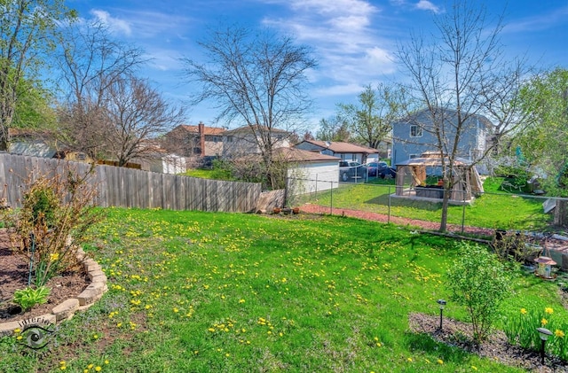 view of yard featuring fence