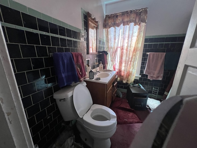 11916 S Harvard Ave, Chicago, IL 60628 - full bathroom with toilet, a wainscoted wall, tile walls, and vanity
