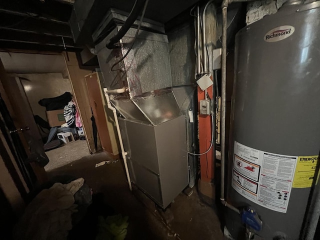 11916 S Harvard Ave, Chicago, IL 60628 - utility room featuring heating unit and water heater