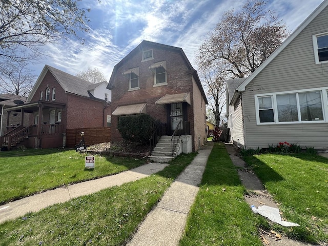11916 S Harvard Ave, Chicago, IL 60628 - view of front of house with a front lawn