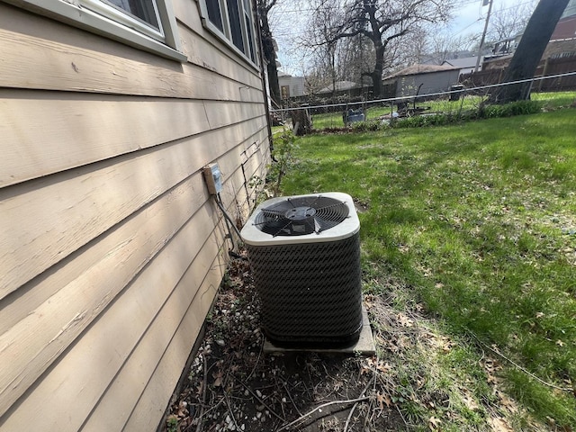 11916 S Harvard Ave, Chicago, IL 60628 - details with a fenced backyard and central AC unit