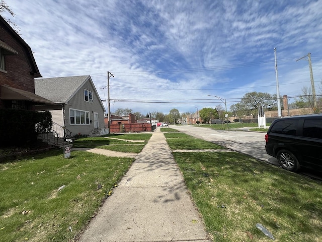 11916 S Harvard Ave, Chicago, IL 60628 - view of street featuring sidewalks and street lights