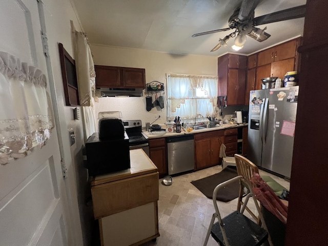 11916 S Harvard Ave, Chicago, IL 60628 - kitchen featuring range hood, a sink, ceiling fan, backsplash, and appliances with stainless steel finishes