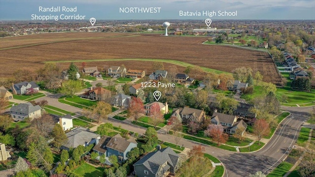 birds eye view of property with a residential view